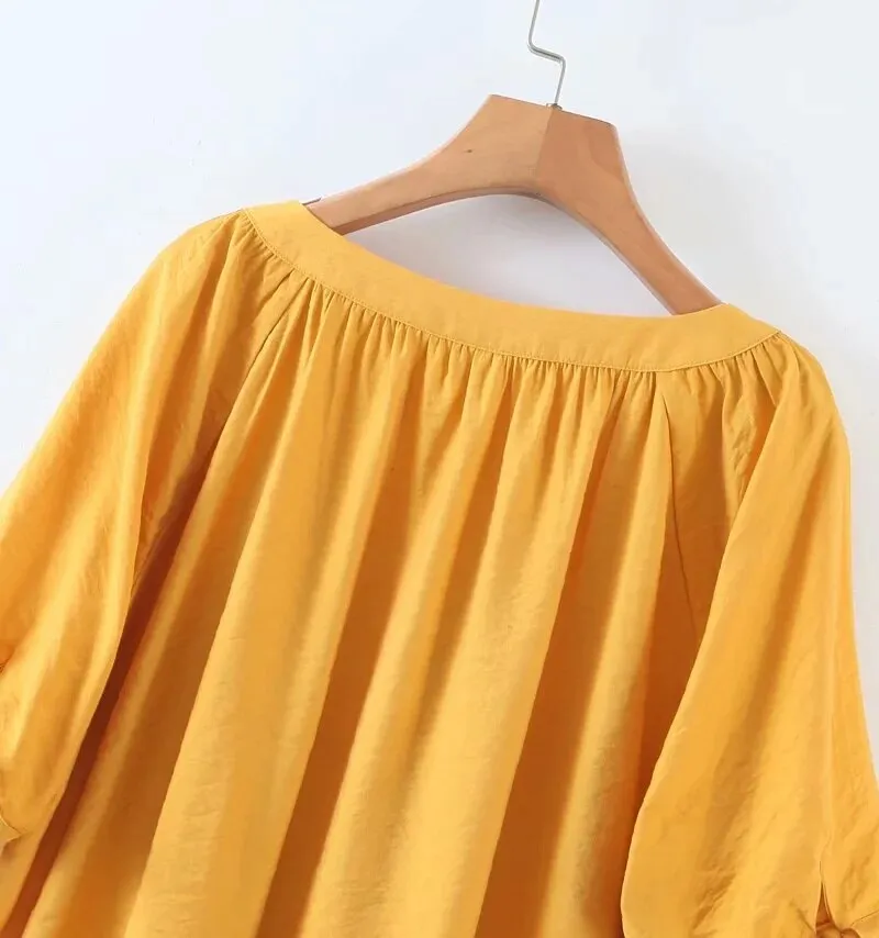 LOOSE BLOUSE WITH BOW TIED